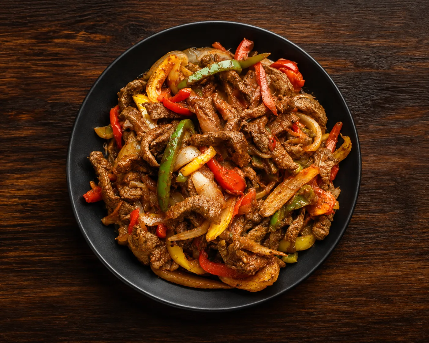Siga tibs sizzling beef with onions and jalapeno at Baro Ethiopian-Eritrean Cuisine in Winnipeg, MB